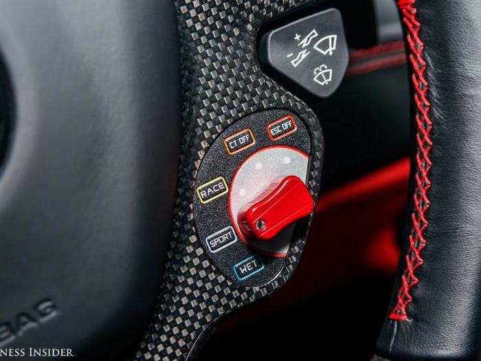 THE MANETTINO: This little red switch controls all the driving modes.