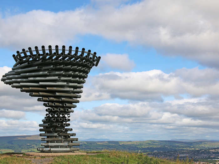 23. The Singing Ringing Tree sits at the top of Crown Point overlooking the town of Burnley, Lancashire. The intricate pipework in the sculpture means that it plays a different chord every time a gust of wind passes through.