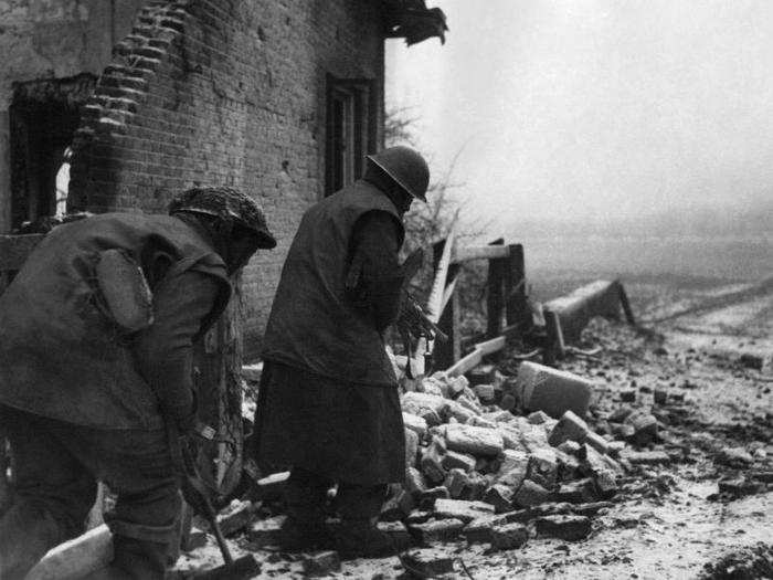 A two-man patrol, a bren-gunner and a piat-gunner, in Belgium on December 31, 1944. Snow had fallen on the two previous days.