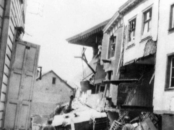 A King Tiger German tank ran against a building in an unnamed Belgium town on December 26, 1944, where it was knocked out of action.