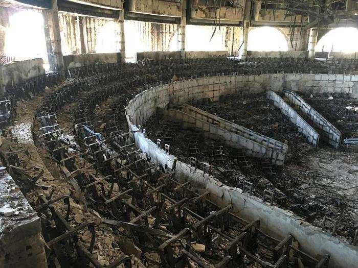 The charred interior of the parliament is seen after it was burned in post-election protests in Libreville, Gabon, on September 20.