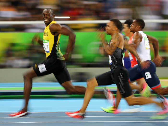 Usain Bolt takes the lead during the Men