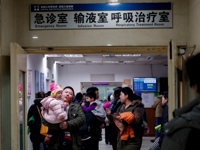 Not all children are so lucky. Here parents take their children to hospitals on the second straight day of a pollution alert across the country