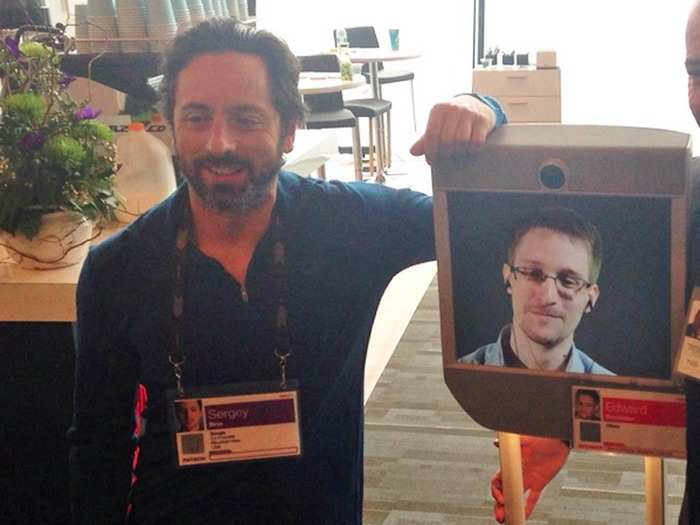 (Here he is "hanging out" with whistle-blower Edward Snowden at a 2014 TED conference.)