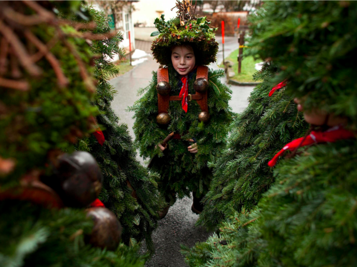 A festival in Appenzell, Switzerland, has people dress in elaborate, homemade costumes made of moss, twigs, and leaves. They circle the town: singing carols, ringing bells to scare away evil spirits, and wishing families a prosperous New Year.