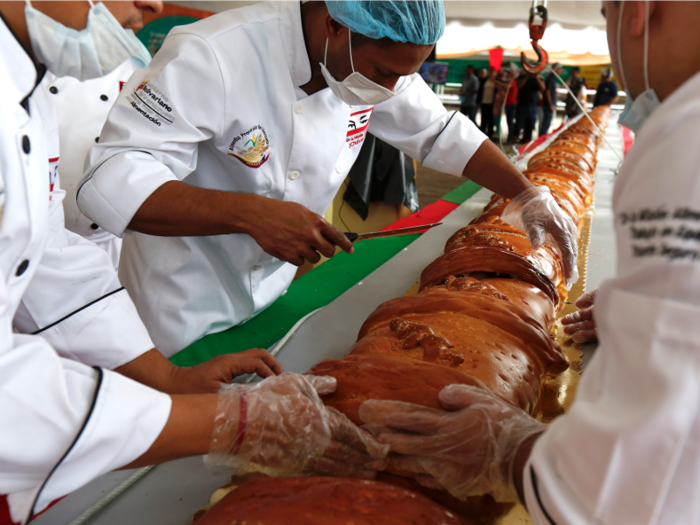 A Christmas dinner is incomplete in Venezuela without the traditional ham bread, which is rolled with olives, raisins, ham, and sometimes bacon stuffed inside.