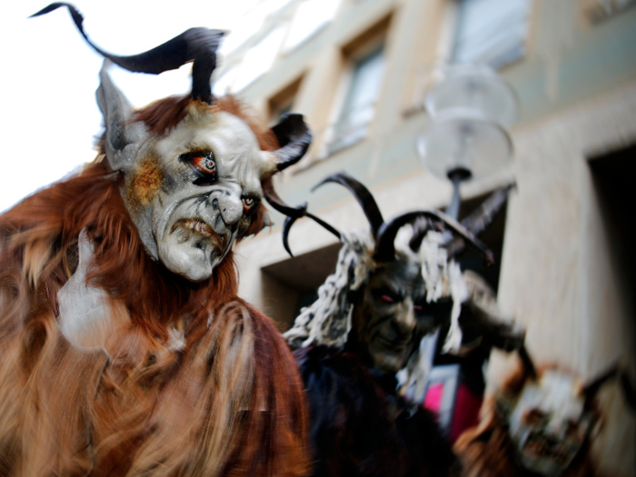 In Munich, Germany, men dressed as Krampus, a creature who punishes the children on Santa