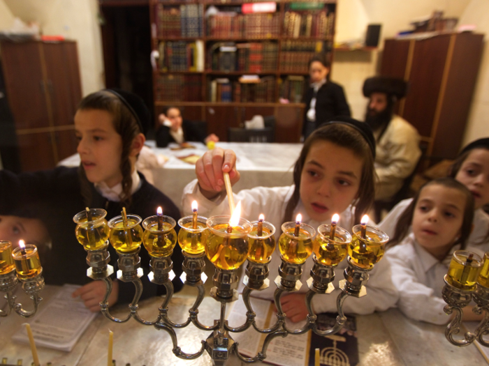 Jewish families around the world light candles on the eight nights of Hanukkah.