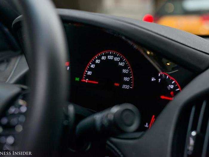 The instrument cluster features a 5.7-inch digital display.