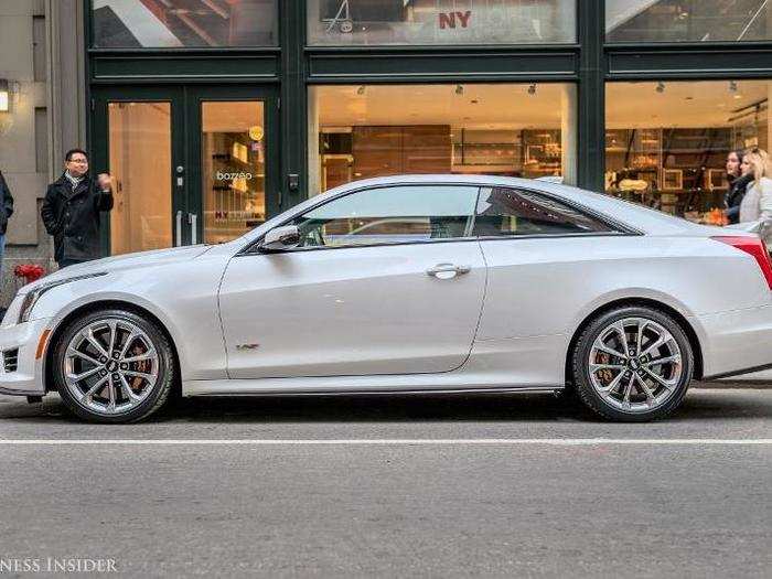 The side profile is much less busy. The slab-sided look has long been a fixture in the Cadillac ATS/CTS design vocabulary.