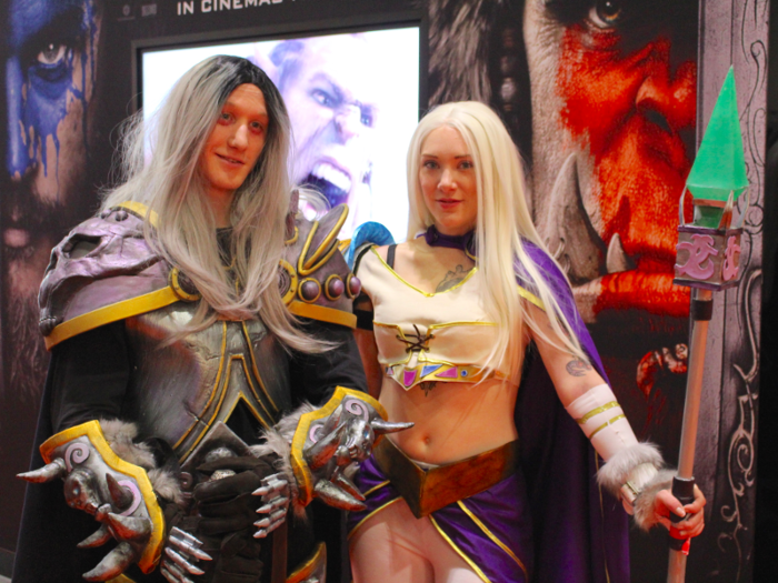 Here are two characters from the "World of Warcraft" computer game standing by the huge pod where Universal Pictures was showing the trailer for the movie adaptation, which is out now.