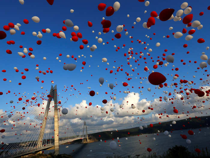 Red and white balloons were released during the opening ceremony of the newly built Yavuz Sultan Selim bridge in Istanbul, Turkey.