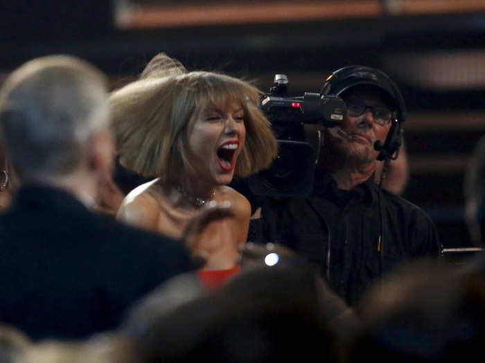 Taylor Swift was overjoyed when she heard the news that friend Ed Sheeran had won Song of the Year at the 58th Grammy Awards in Los Angeles, California.