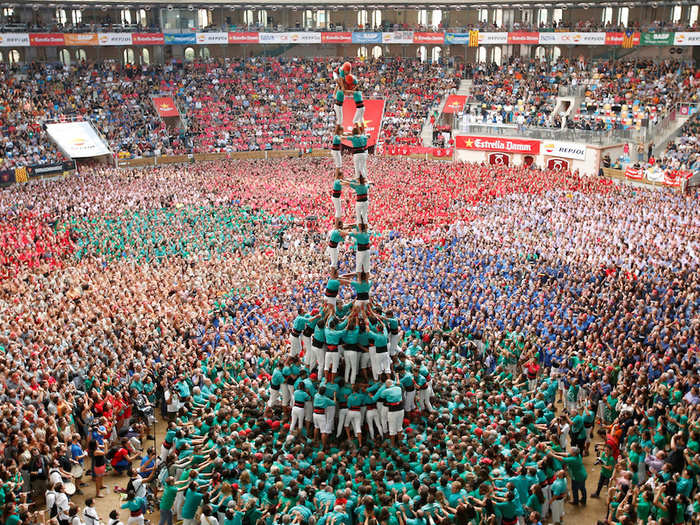 Sport association Castellers de Vilafranca formed a human tower called "castell" during their biannual competition in Tarragona City, Spain.