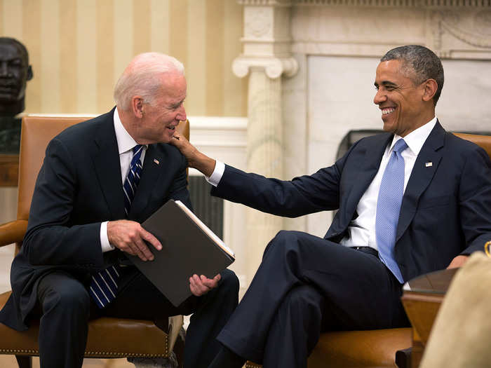 Obama and Biden share a laugh in the Oval Office on July 21, 2014.