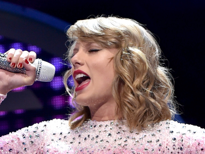 The curly short hair was definitely here to stay. Here she is at the 2014 iHeartRadio Music Festival.