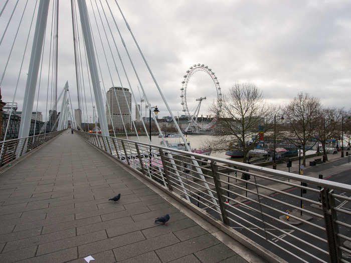 Only pigeons were seen crossing the River Thames by way of The Golden Jubilee Bridge.