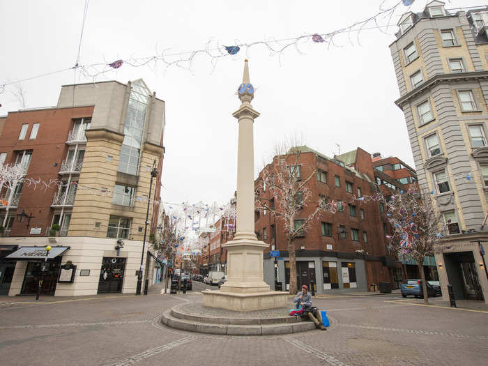 Seven streets packed with busy shops, restaurants, and bars meet at this point in London