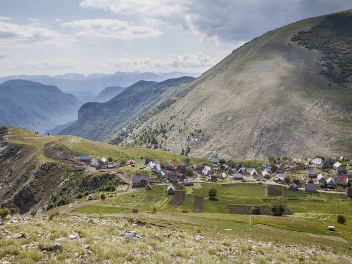 Take a scenic walk in Lukomir, a remote village in Konjic, Bosnia and Herzegovina, that sits on the lip of a large canyon.