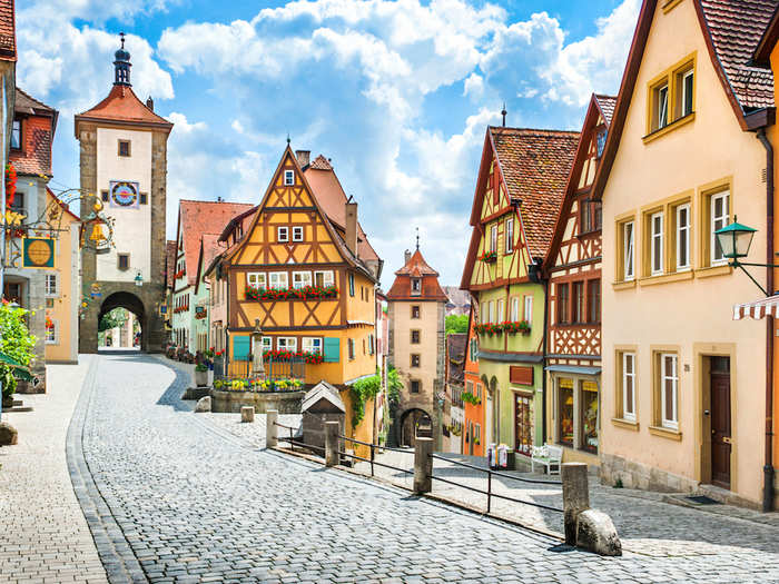 In Germany, venture to the small town of Rothenburg ob der Tauber between Munich and Frankfurt for cobbled streets lined with medieval architecture.