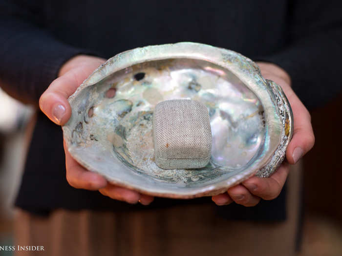 A giant seashell cups the engagement ring box that Charlie used in his proposal.