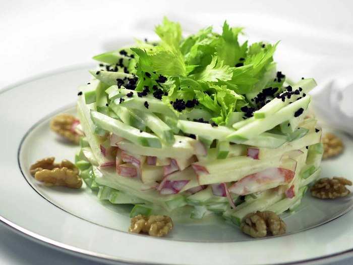 Tschirky is also known for creating the famous Waldorf salad, which typically contains apples, mayonnaise, celery, and walnuts. It