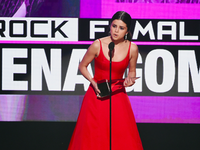 And finally, she made waves wearing this red gown when she accepted the American Music Award on Sunday for favorite female artist in the pop/rock category.