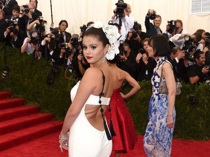 Her "China: Through the Looking Glass" look for the 2015 Met Gala had her decorated with flowers and wearing Vera Wang.