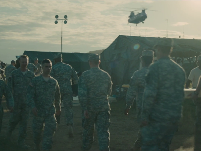 Check out that alien landing pad looming in the background of this army base.