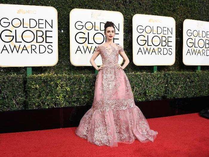 Lily Collins shimmered and stole the show in this number.