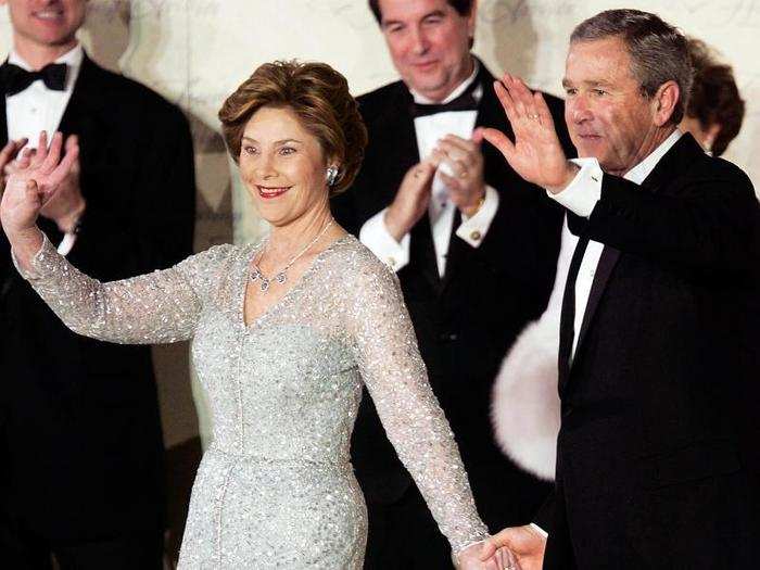In 2005, Laura Bush wore a silver gown outlined with Austrian crystals by Oscar de la Renta.