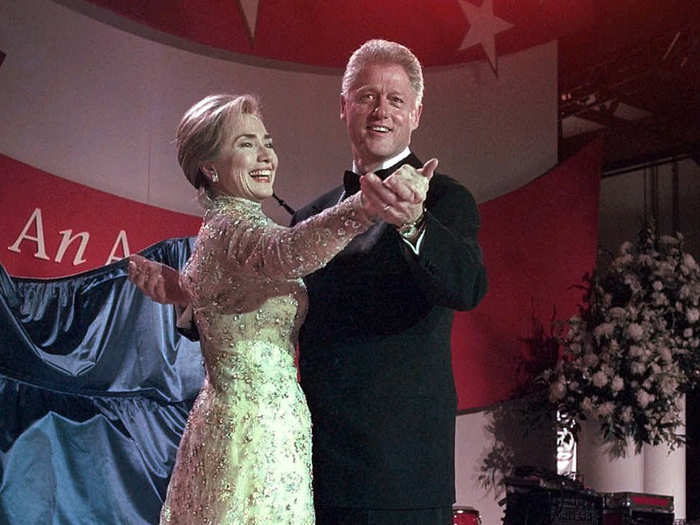In 1997, a record number of 14 inaugural balls were held for President Clinton. This time around, Hillary Clinton went with a gown designed by well-known designer Oscar de la Renta.