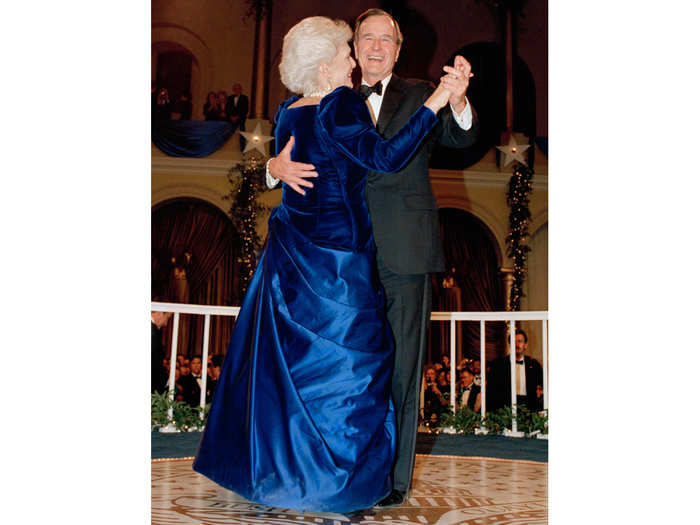 First lady Barbara Bush wore a dress designed by Arnold Scaasi for the 1989 inaugural ball. Scaasi, who had been designing clothing worn by first ladies since Mamie Eisenhower, called this two-tone gown "Barbara blue."
