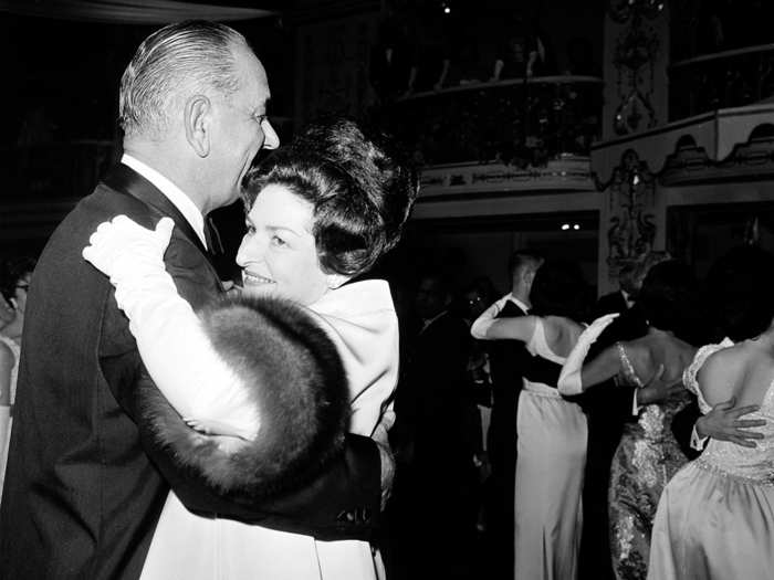 Lady Bird Johnson wore a long yellow gown and coat with fur lining by American designer John Moore to the 1965 inaugural ball. The New York Times reported that the Johnsons danced to the song "The Way You Look Tonight."