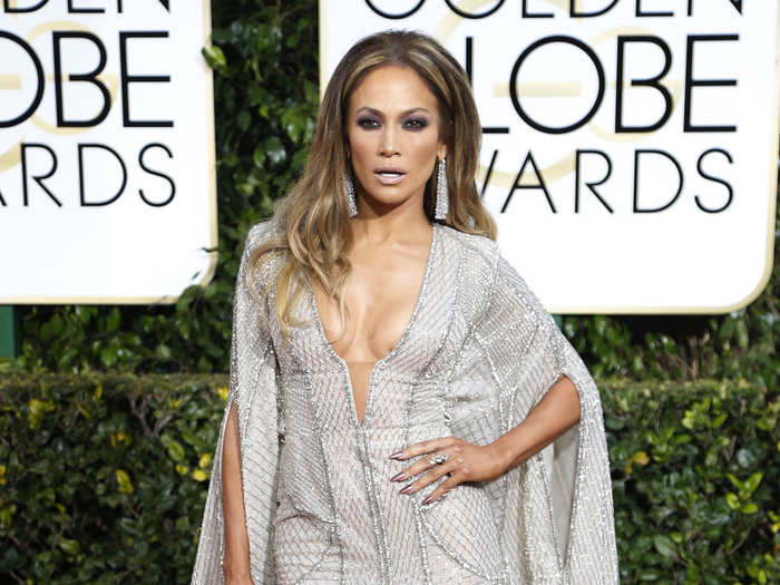 She looked gorgeous at the 2015 Golden Globes in a silver dress complete with cleavage, a slit, and basically its own cape.