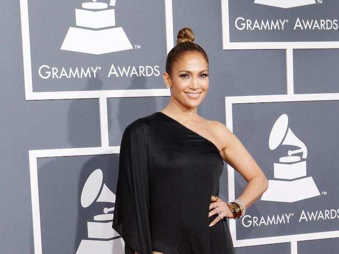 She bared a lot of skin in this sexy but simple black dress at the Grammys later that year.