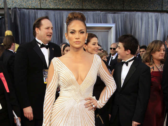 Lopez look chic at the 2012 Academy Awards thanks to cut-out long sleeves and bold stripes.