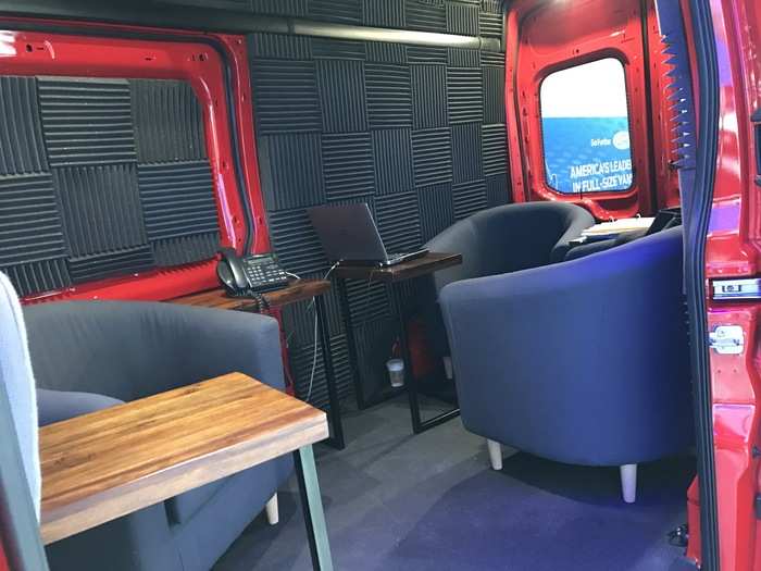 Ford brought a rolling office, set up inside a Transit van.