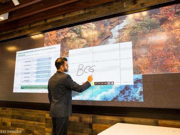 State-of-the-art video and audio capabilities are in all of the conference rooms, including this 24-by-6-foot display screen that acts as a touch-enabled digital canvas — perfect for big presentations.