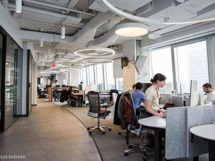 As for more formal work stations, BCG offers convertible sit-to-standing desks in their open-seating floor plan.