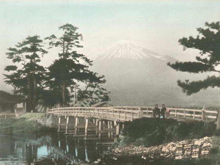 Mountain Fuji towers over Tokyo in the image below, circa 1910s: