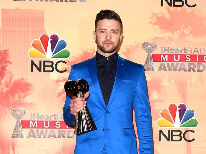 Things took a turn for the interesting when he hit the 2015 iHeart Radio Music Awards in an electric blue suit.