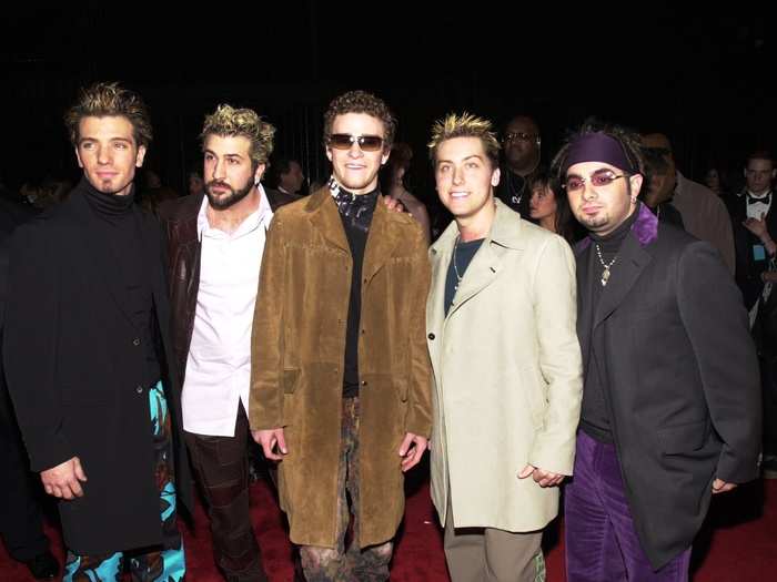 Justin rocked a knee length suede jacket when he hit the red carpet with the rest of *NSYNC in 2001 for the People