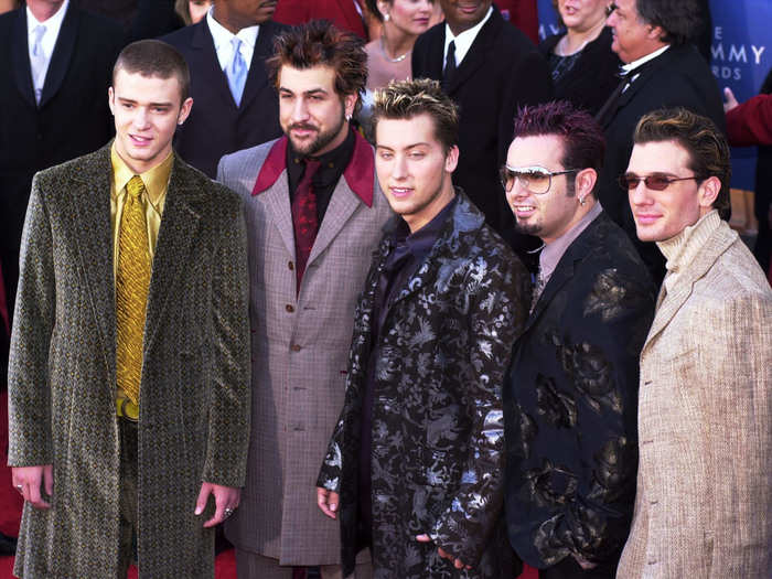 Justin Timberlake, in an interesting combination of green and yellow satin, posed with *NSYNC members at the 2001 Grammys.