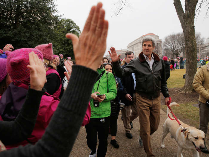 There were politicians in attendance, too. Former US Secretary of State John Kerry walked a yellow Labrador along the march route while giving out high-fives.