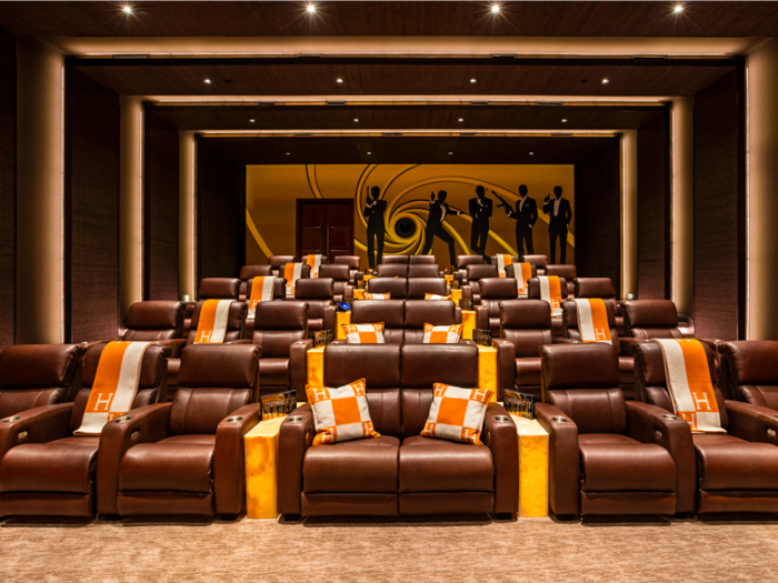 6. The 40-seat theater rivals the size of multiplexes. It features a 4K projector screen and Dolby Atmos sound system.