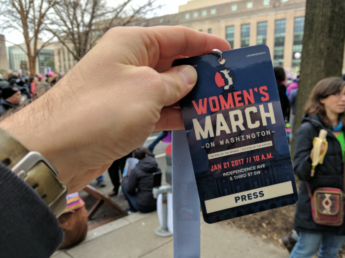 After squeezing down the street with a backpack full of camera gear, I found the press-credentialing table around 12:30 p.m. ET... Only to find they