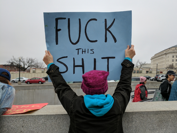 As I emerged above-ground near the Capitol building, loud cheers — and colorful signs — greeted everyone.