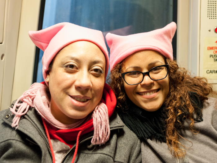 I saw countless marchers wearing pink "pussy hats", like these two friends I interviewed on the Metro. They wore them in solidarity and protest of President Trump