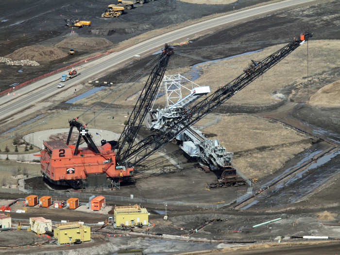 Just north of the memorial sit these two machines some companies used in mining up until 2006 — a dragline on the left, and a gray bucketwheel to the right.